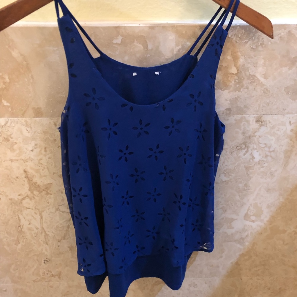 Blue shirt with flower print cutouts